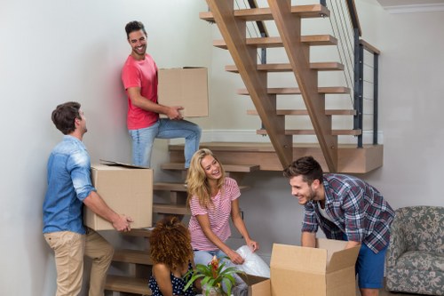 Office relocation team preparing furniture for a Kingston business move