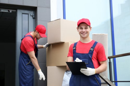 Professional packing team preparing boxes for a Kingston home move