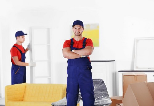 Local removal company helping a Kingston home move with boxes and furniture