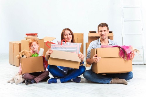 Office removals in Kingston planning with moving boxes and desks