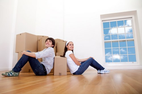 Kingston movers loading boxes and furniture into a removal vehicle