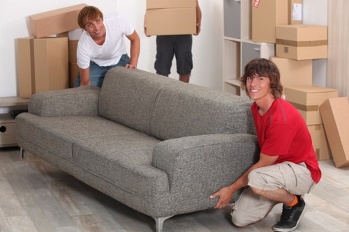 Kingston movers packing household items with care for relocation