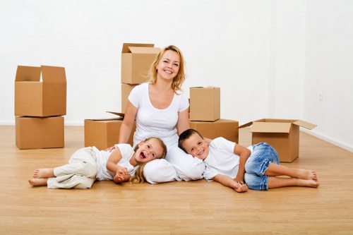 Boxes and wrapped furniture prepared for a house move in Kingston