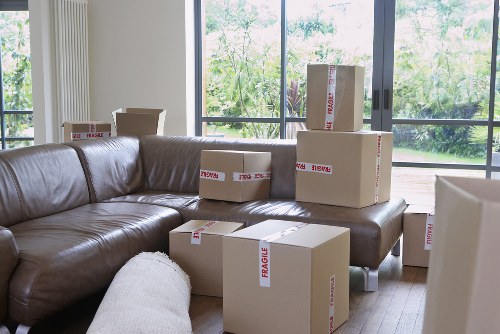 Packed office boxes and equipment ready for removals in Kingston