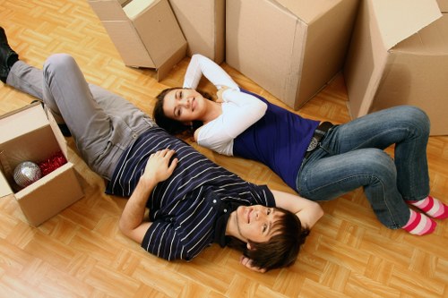 Packed office items and furniture ready for a Kingston business move