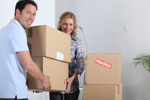 Professional office relocation team handling business equipment in Kingston