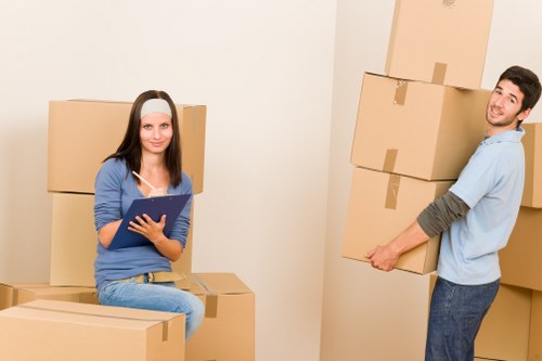 Packed moving boxes inside a Kingston removal van